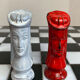 Chess set with ceramic board and pieces.