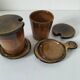Pair of glazed stoneware cups with saucers and lids
