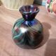 Iridescent marbled vase in the style of Loetz.