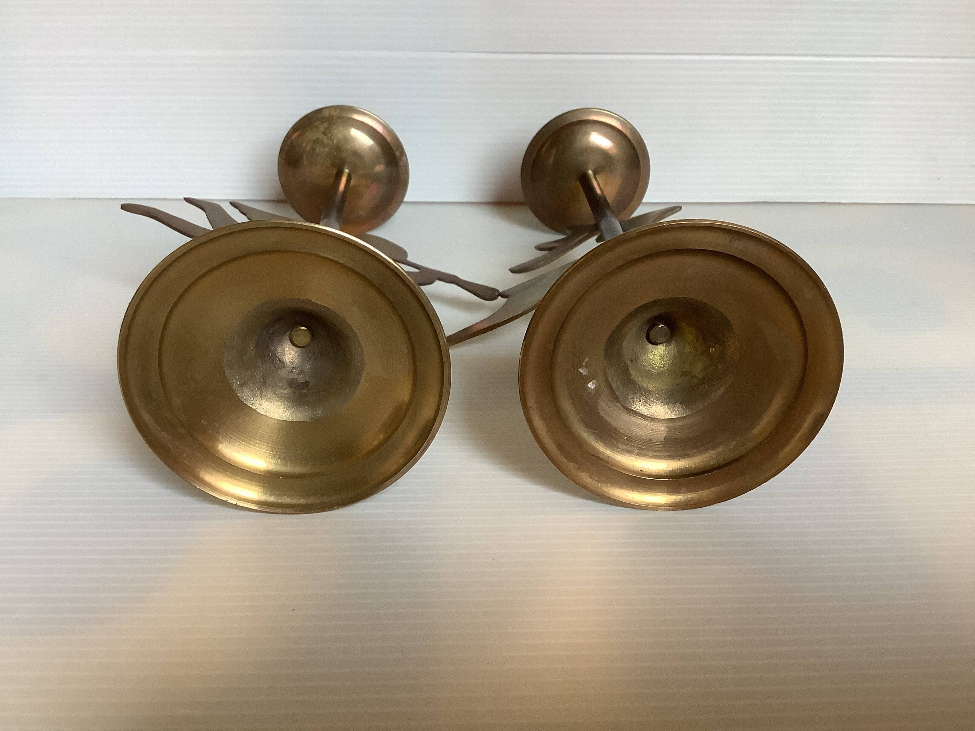 Pair of brass Christmas angel and reindeer candle holders