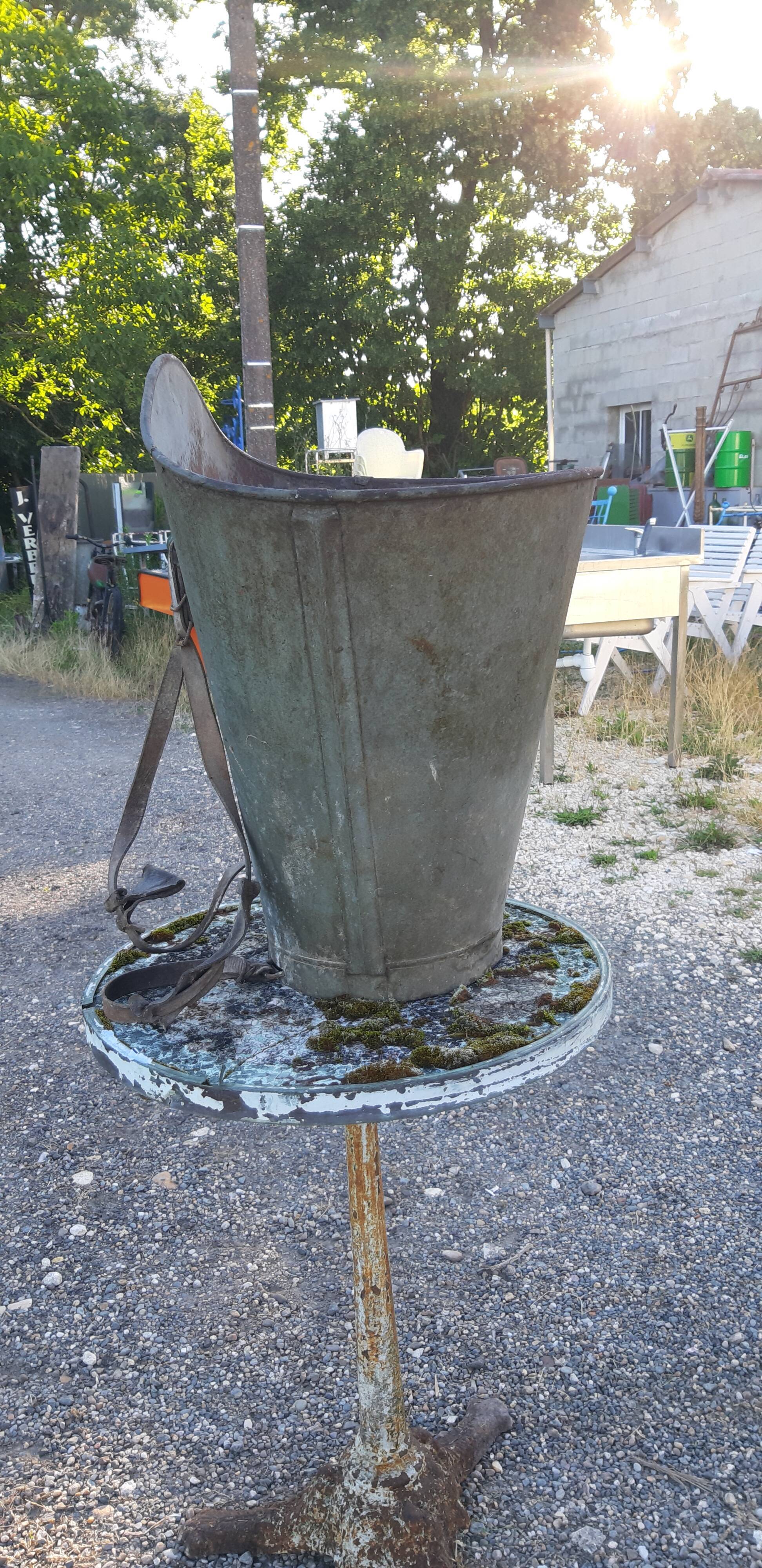 Galvanized metal and leather harvest hood