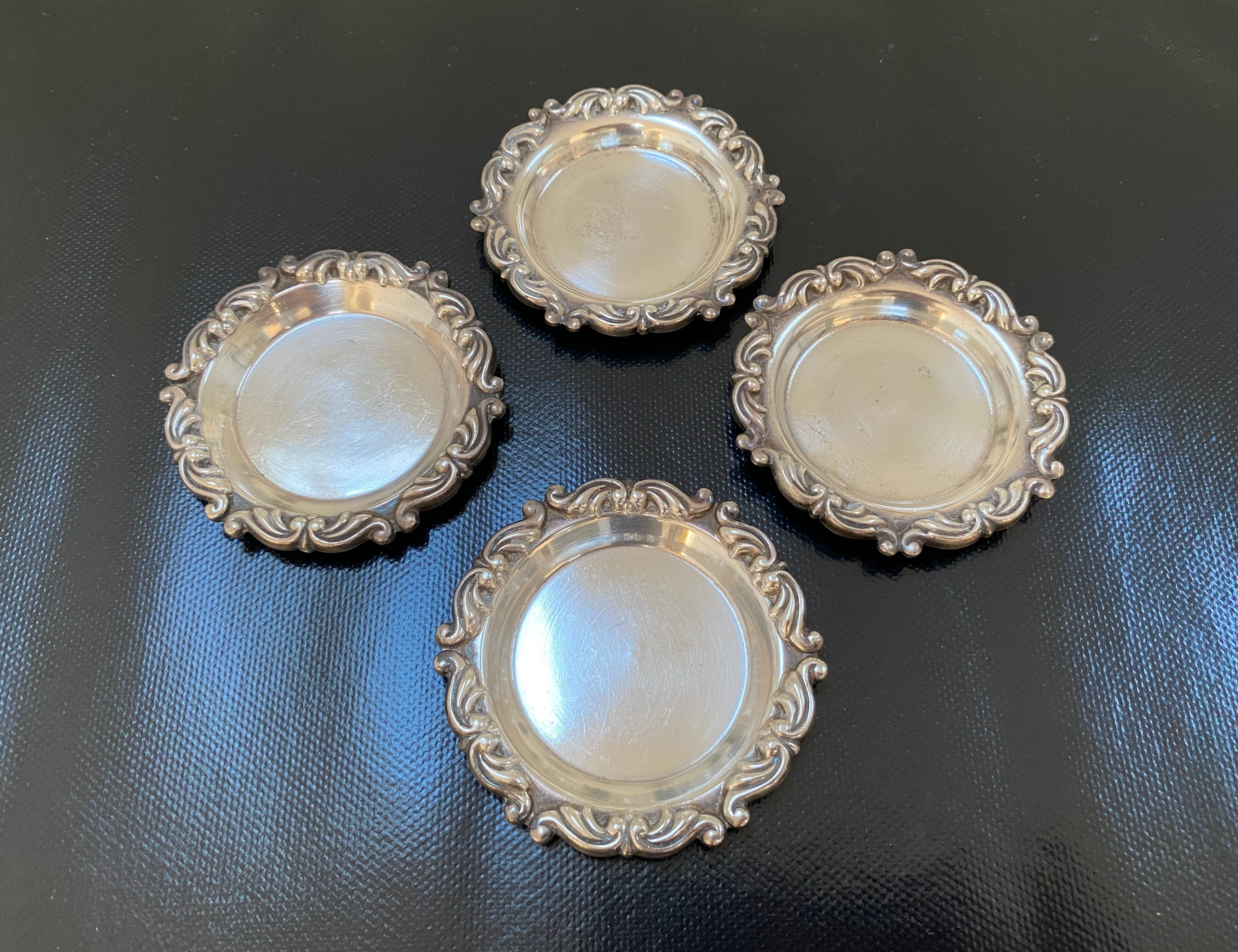 Set of 4 antique silver cups