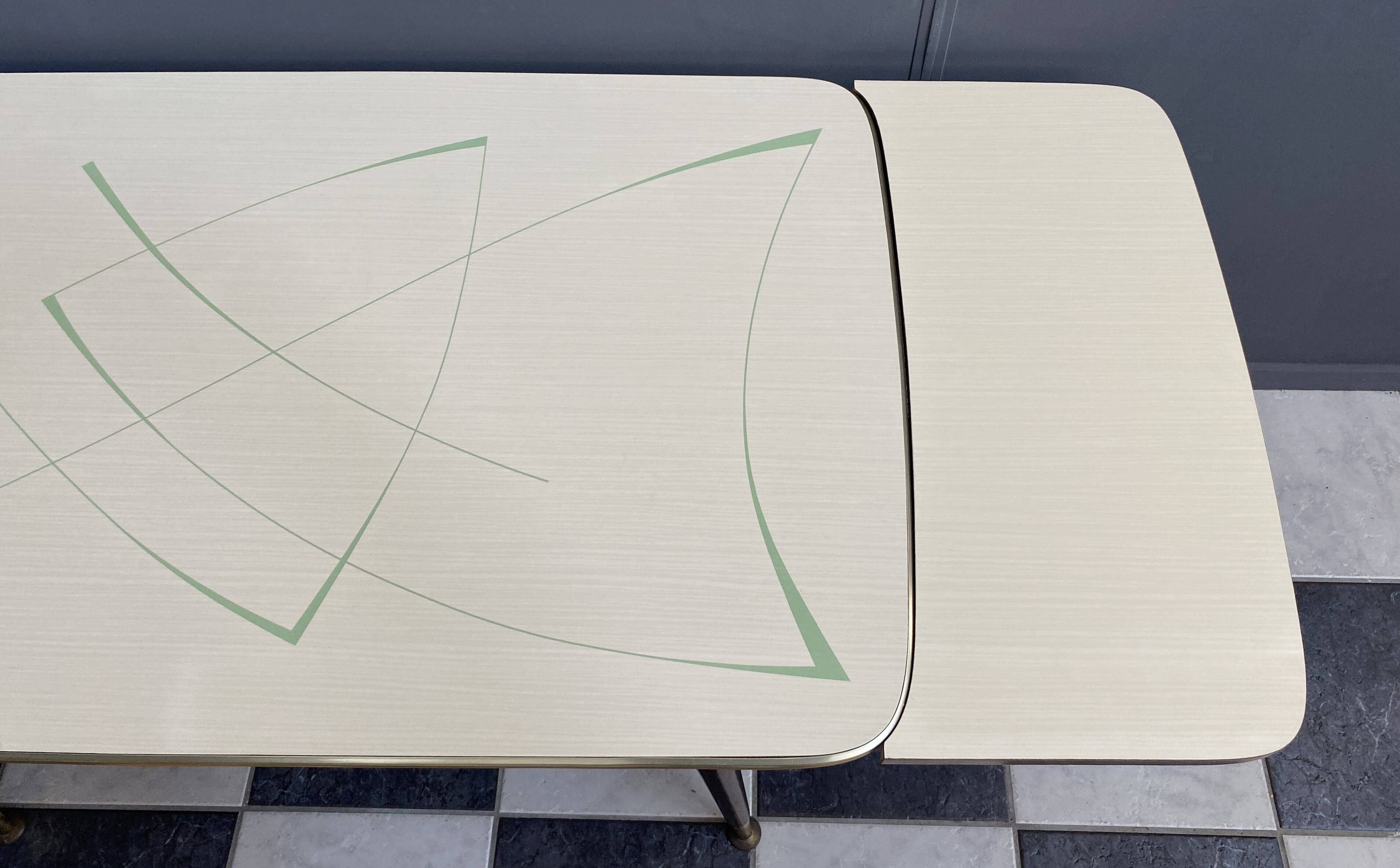 cream and green color 1960s formica dining table enlarge and changing in height