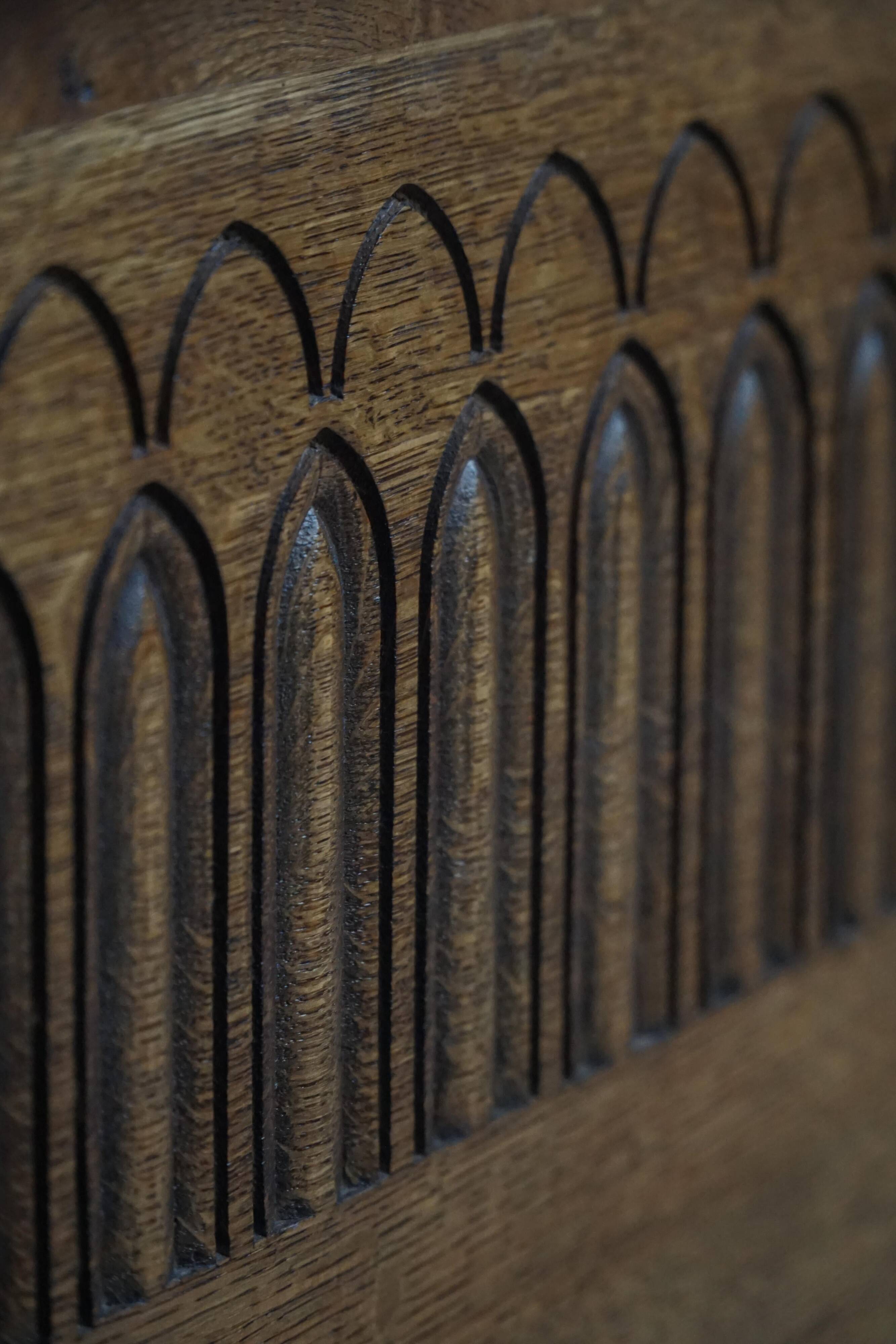 Modern Danish oak commode with decorative relief sculpture, mid-20th century.