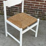 Vintage chair with wicker seat, minimalist design