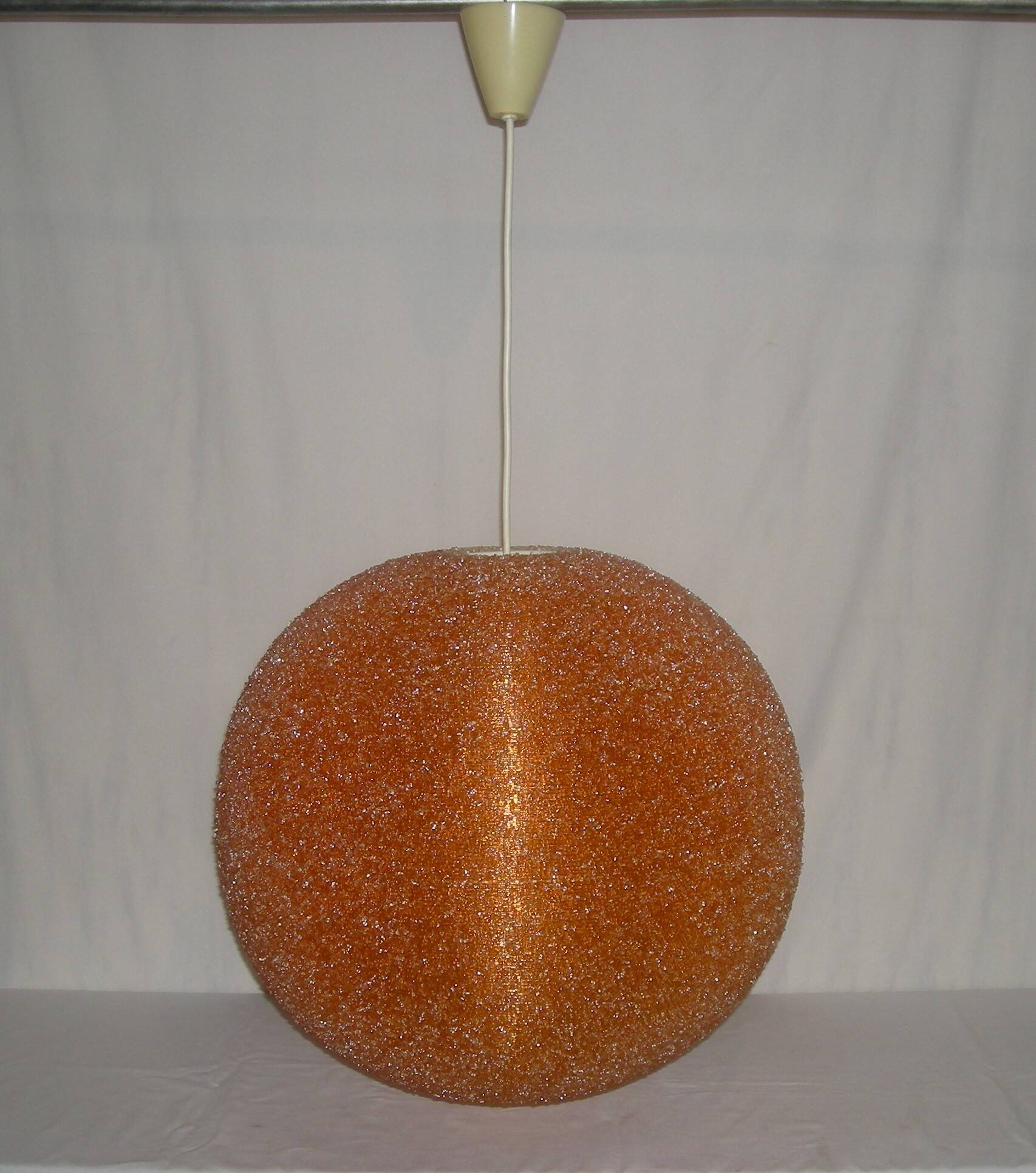Suspension orange Sugar ball by John and Sylvia Reid from the 1960s.