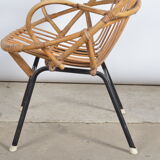 Rattan shell armchair with armrests