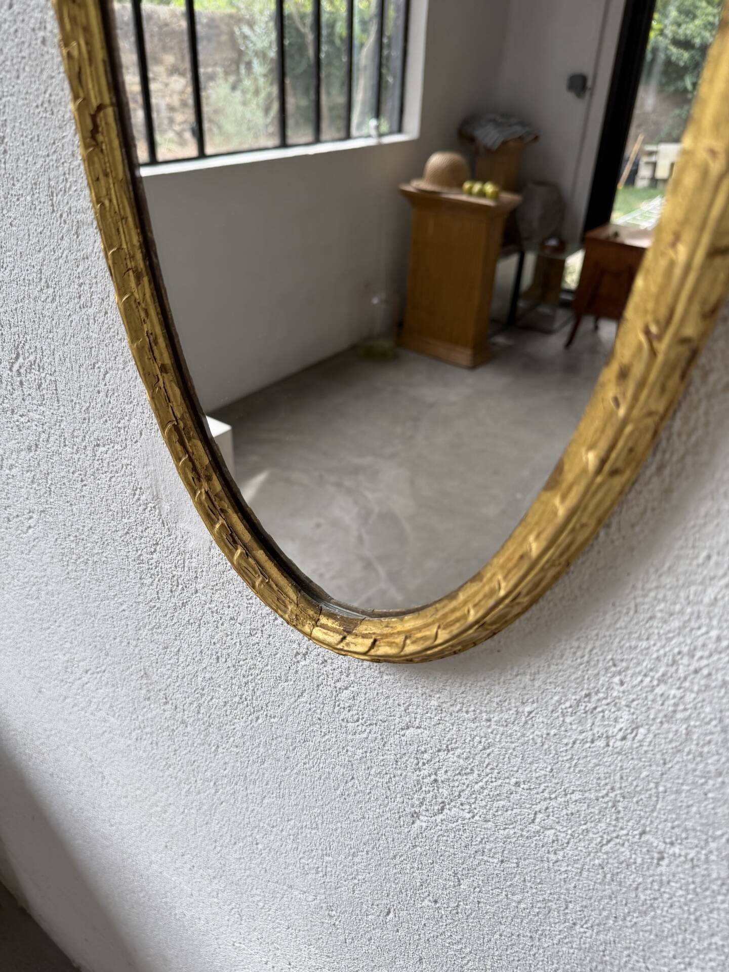 Pair of oval mirrors 1900 gilded stucco