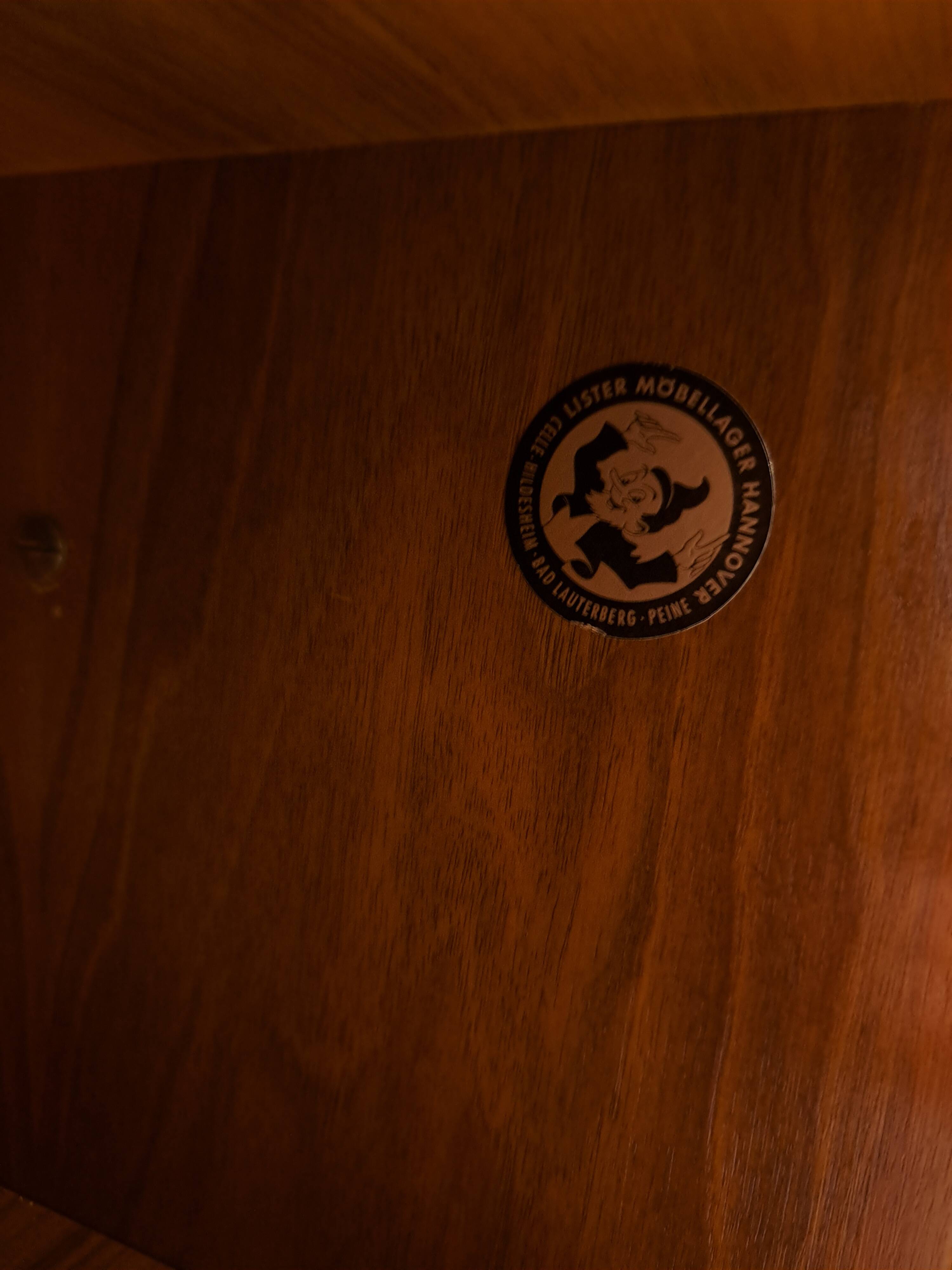 Modulair Omnia wandsysteem, Hilker, teak en zwart staal met legplanken