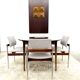 Danish round dining table in rosewood – 1950s design with butterfly extension.