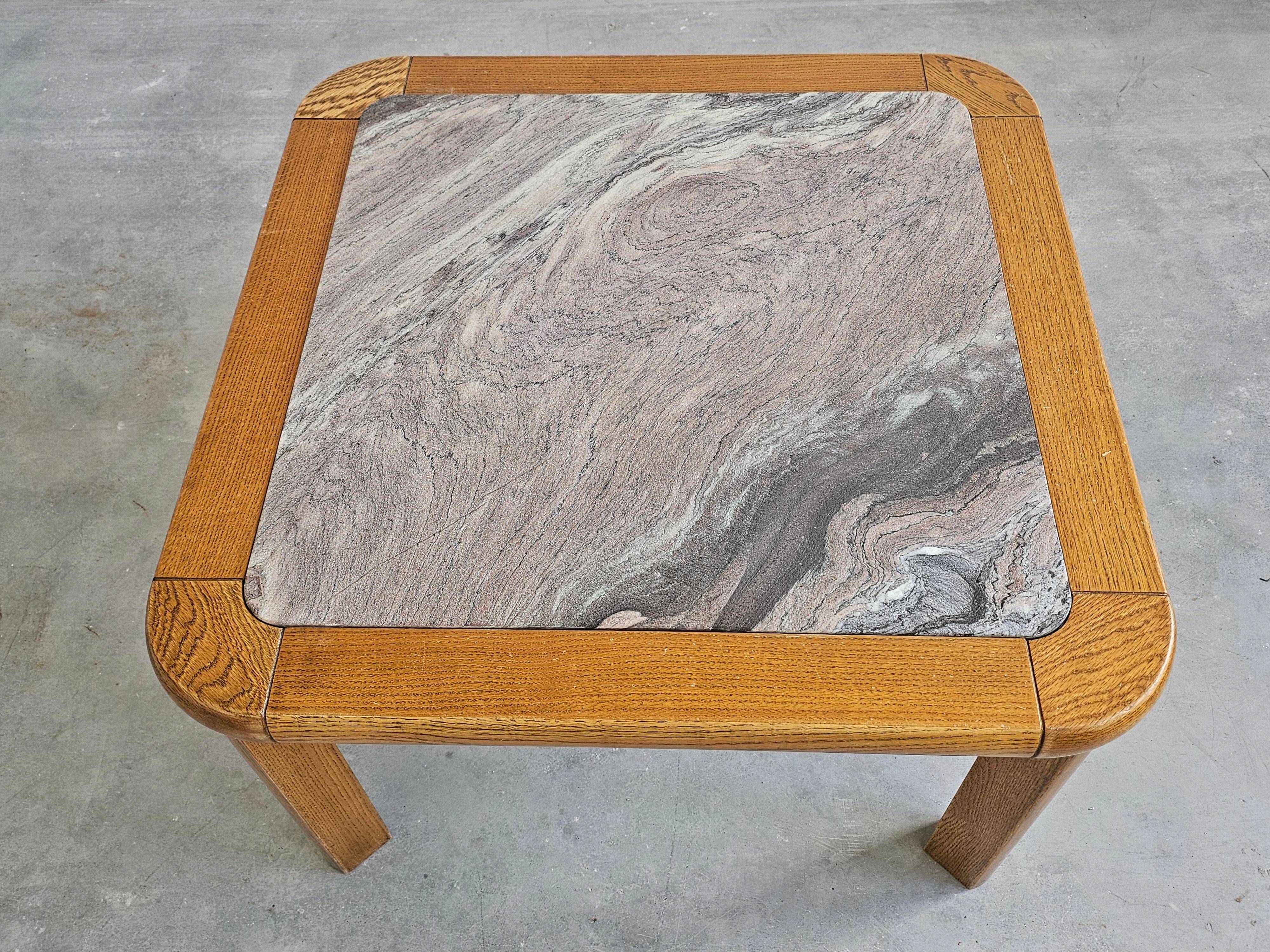 Brutalist coffee table in solid oak with a Rosso Luana marble top.