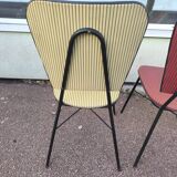 Set of 3 vintage yellow and red faux leather chairs.