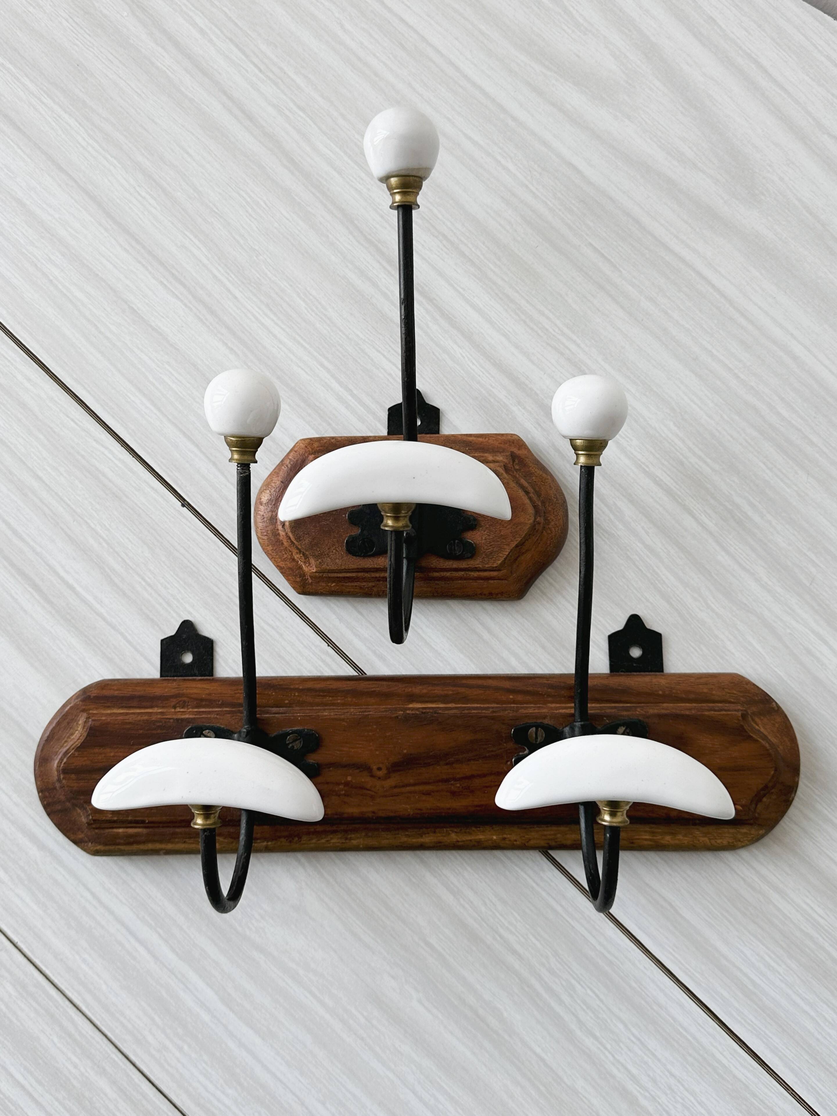 Set of two wooden and porcelain coat hooks