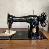 Singer sewing machine in its cabinet