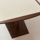 Brutalist conference table made of wood and steel