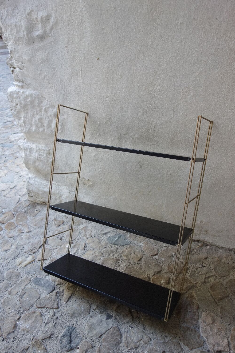 Golden wall string shelf