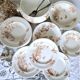 Antique iron earthenware plates accompanied by dishes