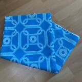 Vintage square cotton tablecloth with graphic patterns.