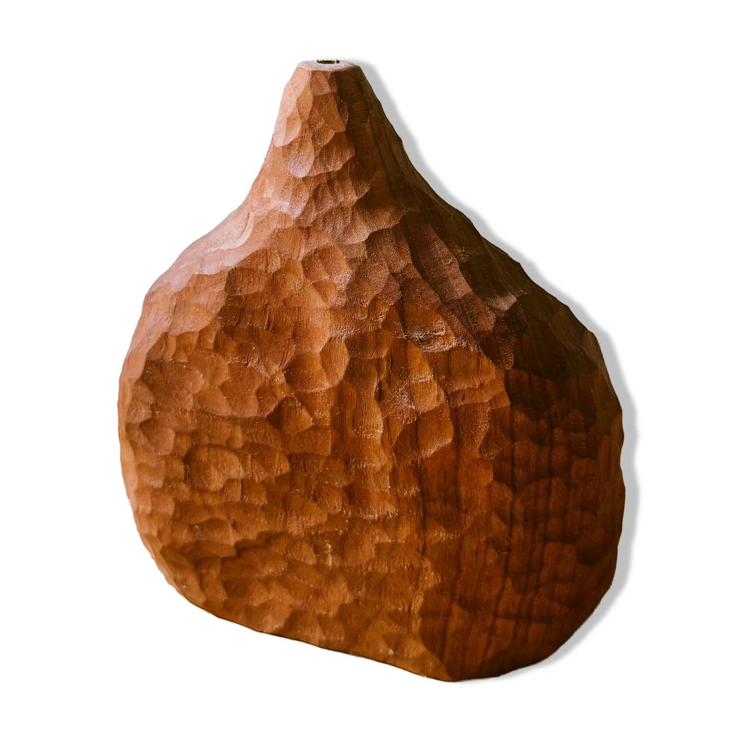 Hand-carved soliflore vase in solid cherry wood.