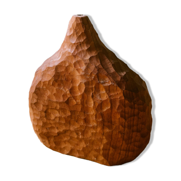 Hand-carved soliflore vase in solid cherry wood.