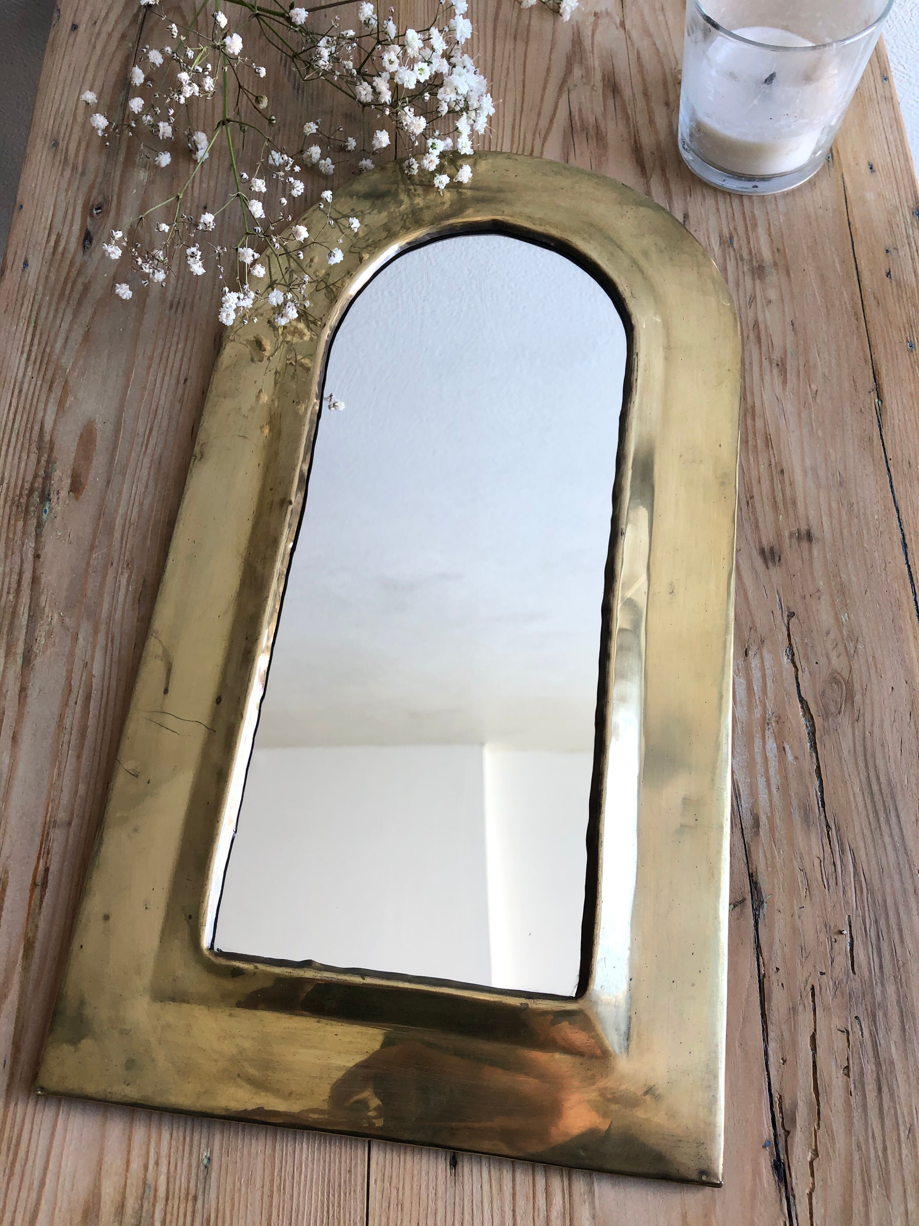 Half moon brass mirror