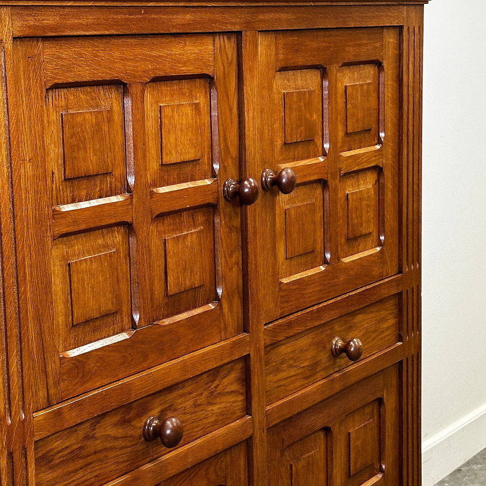 Artisan brutalist oak cabinet with turned knobs, France, 1970s