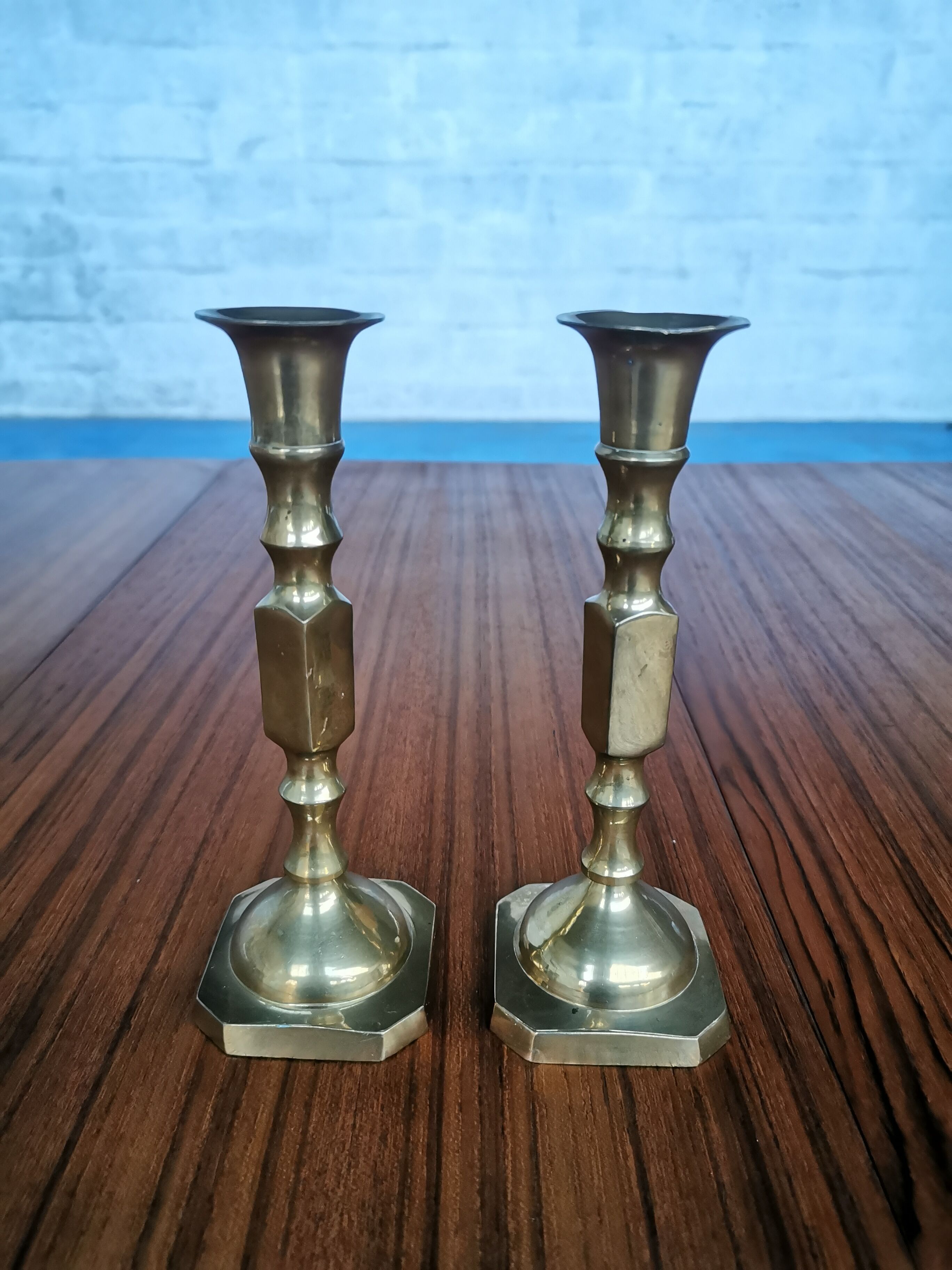 Duo of brass candle holders