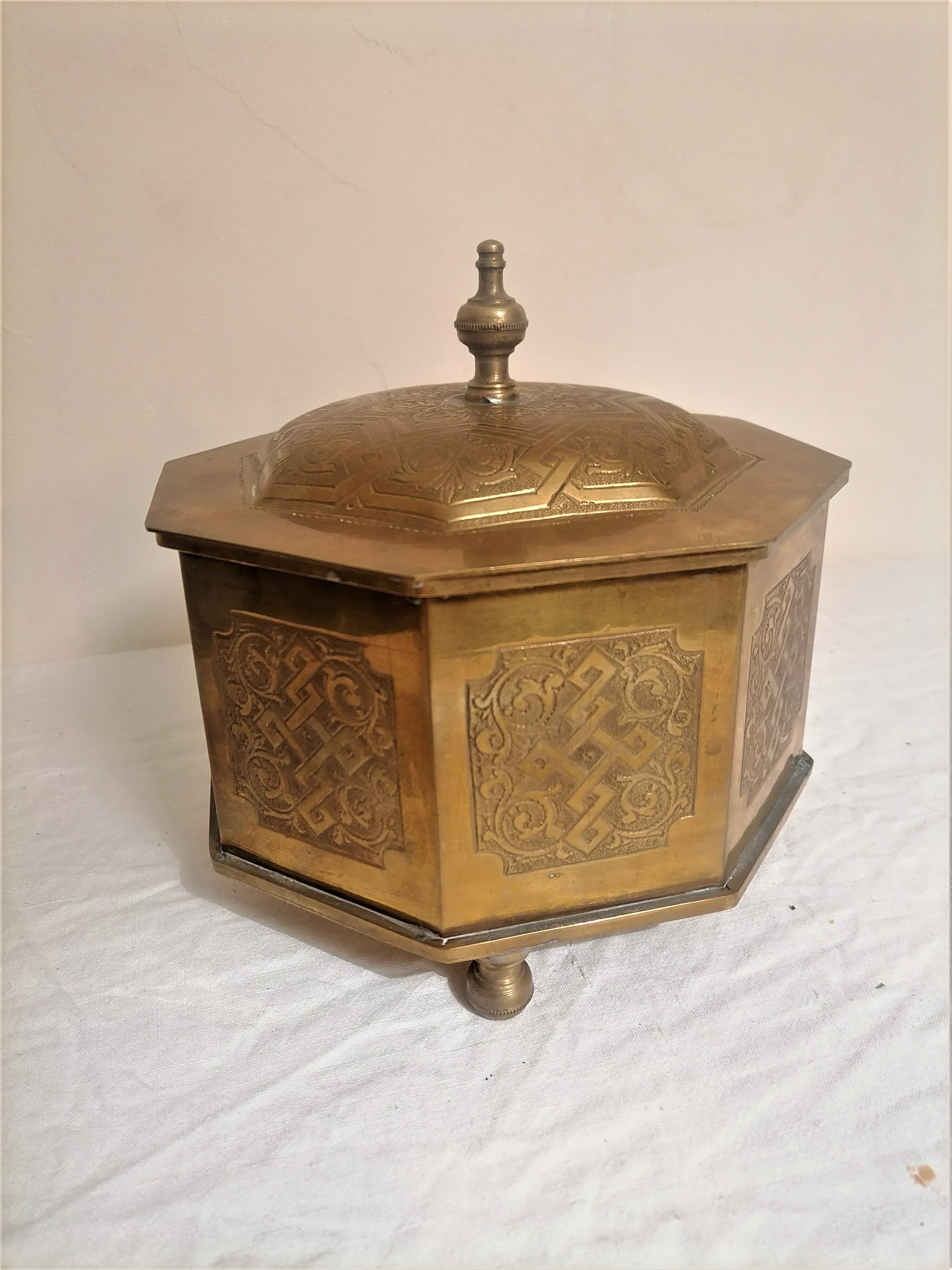 Old oriental tea box in engraved brass