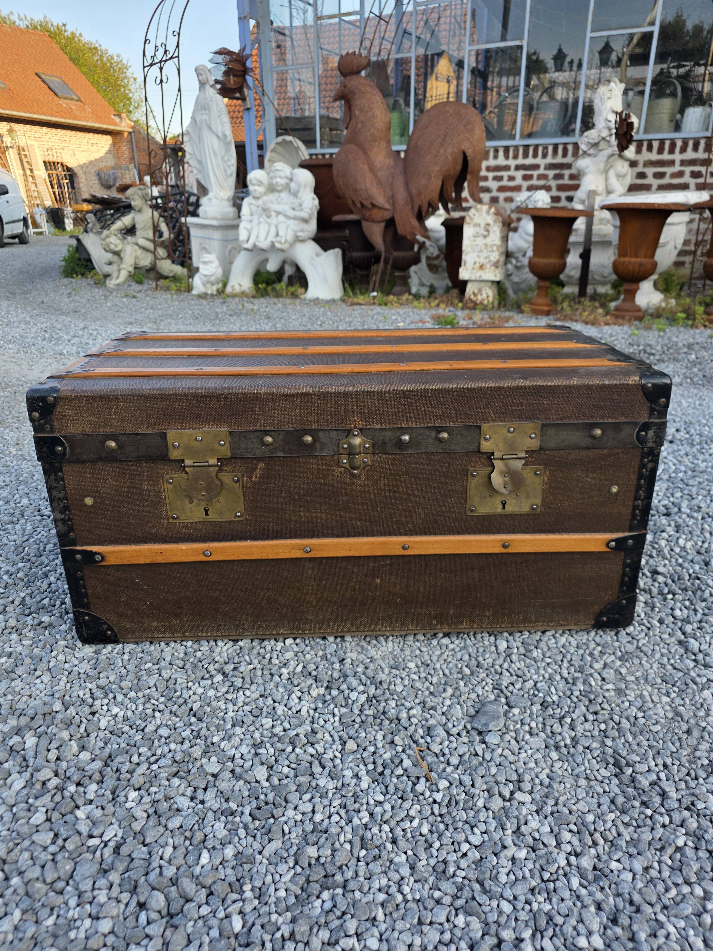 Old travel trunk in oilcloth