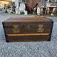 Old travel trunk in oilcloth