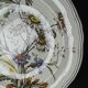 Antique Longchamp shallow dish with polychrome daisies in ironstone.