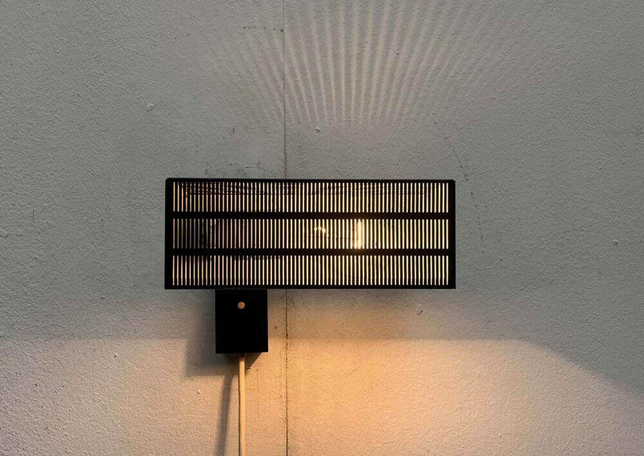 Mid-century German minimalist wall lamp model Flamingo by BUR, Bünte & Remmler Leuchten, 1960s.