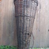 Old grape pickers basket woven wicker vintage wine vines decoration
