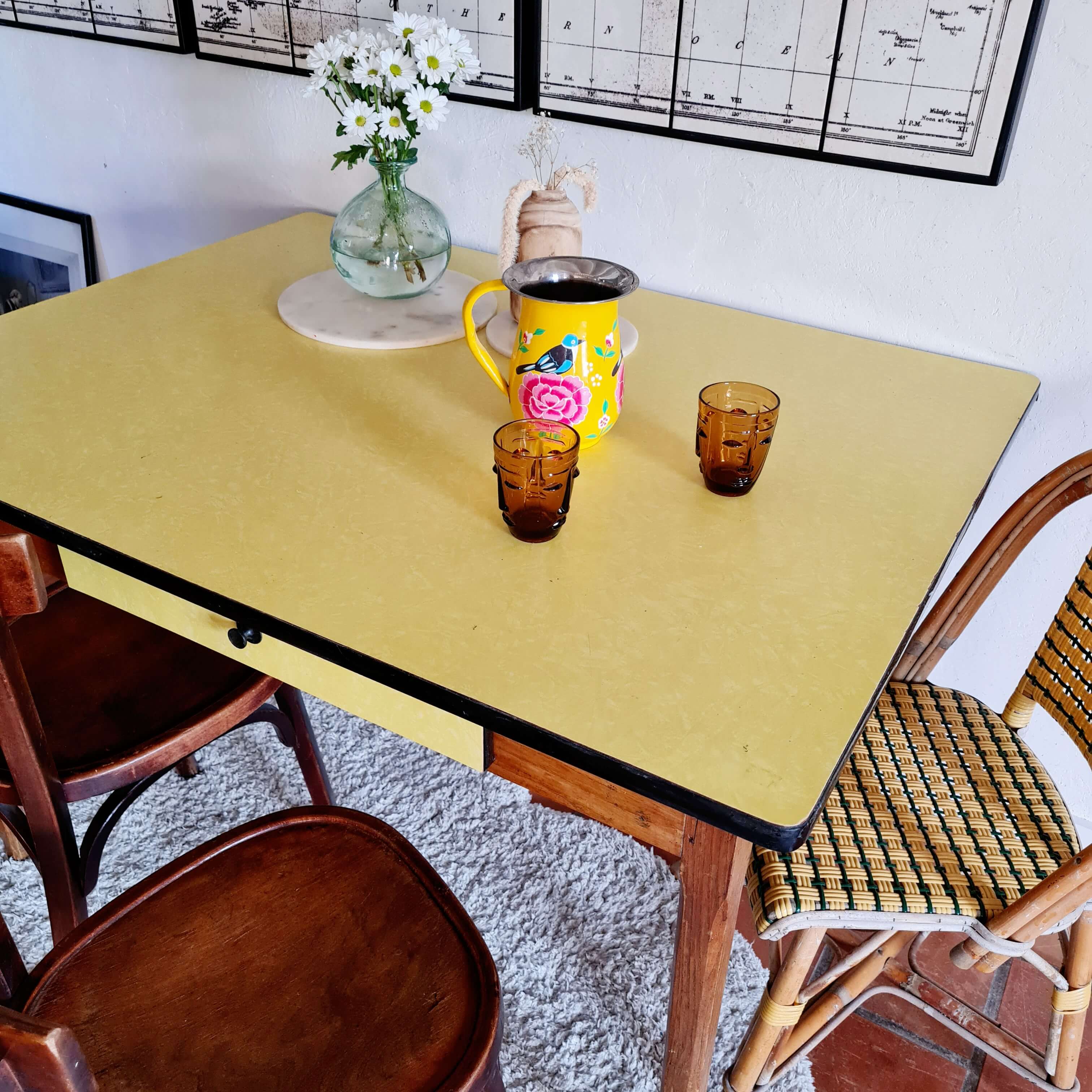 Old wooden farmhouse table and yellow formica top