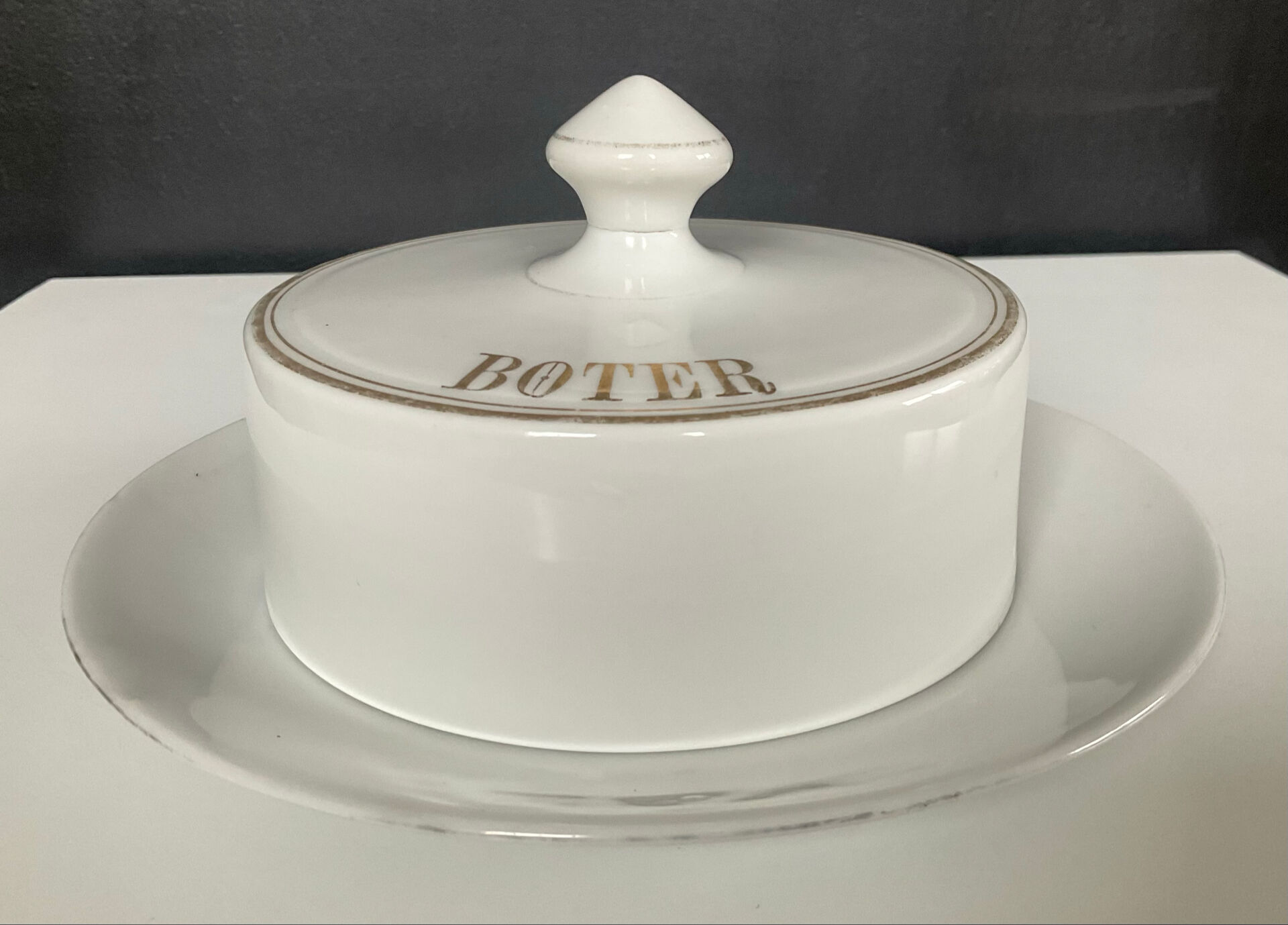 Vintage butter dish in enamelled porcelain