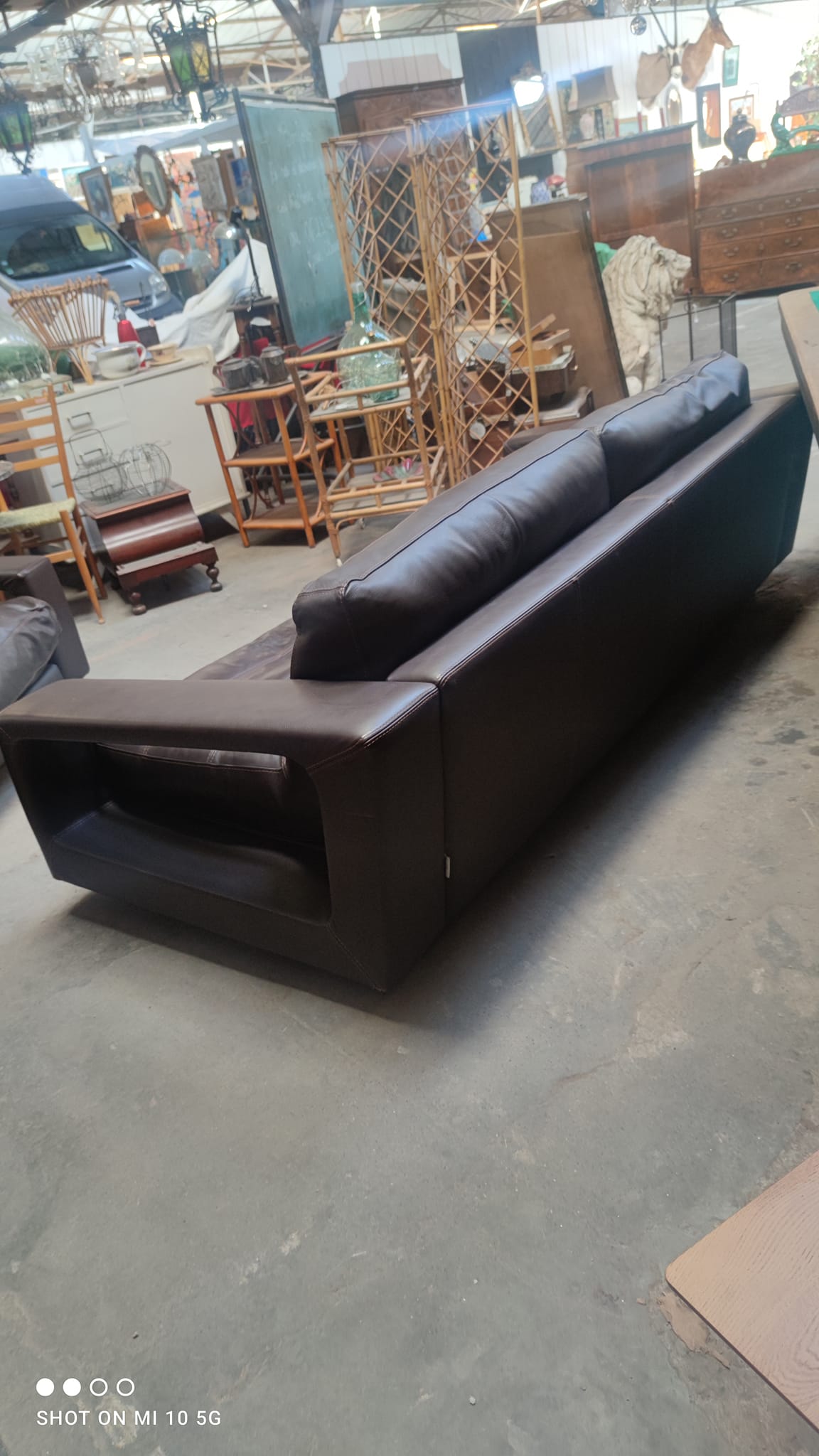 Four-seater sofa in dark brown leather from Steiner by designer Pascal Daveluy, model