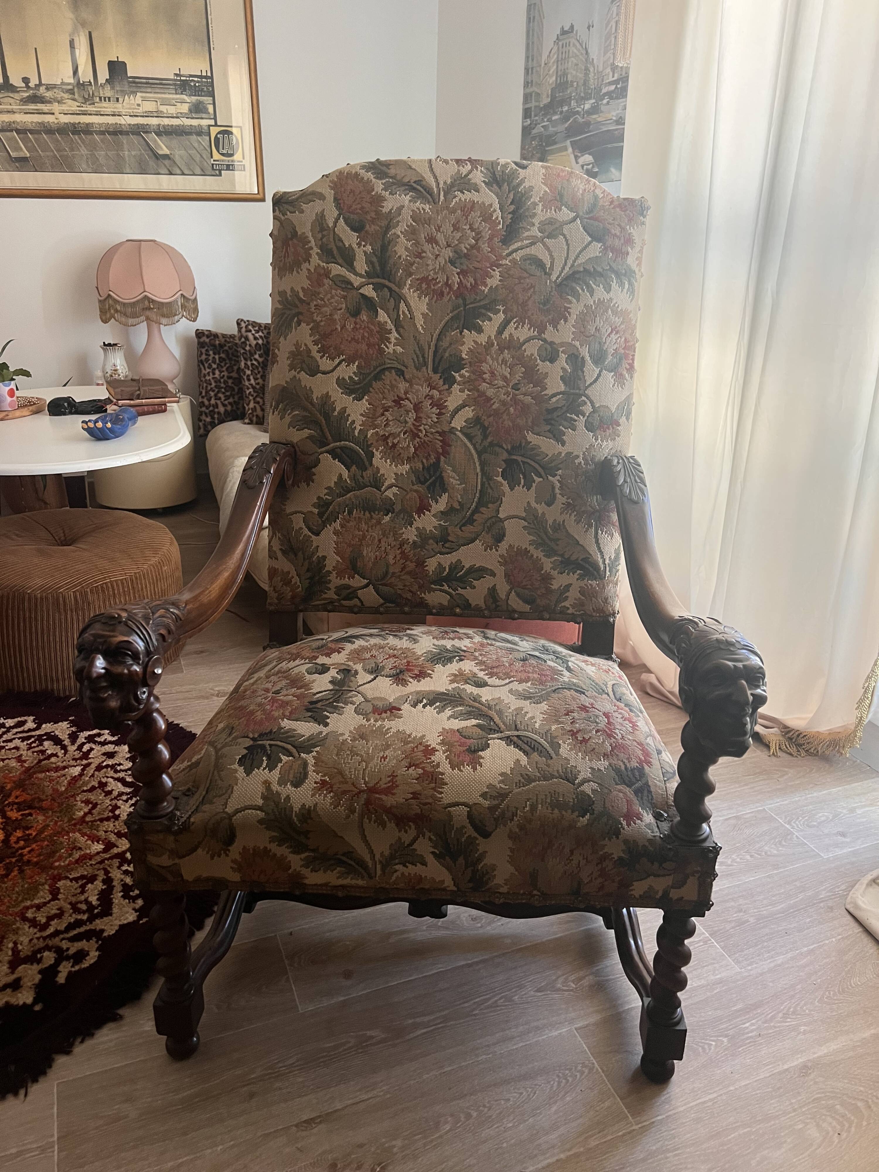 Antique armchair in Henri II style with masks