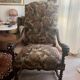 Antique armchair in Henri II style with masks
