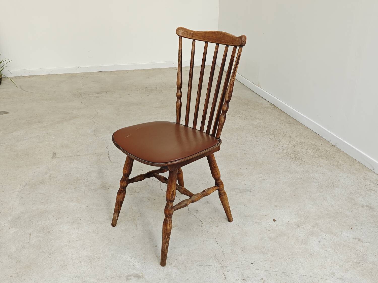 Baumann Tacoma bistro chair, wood and brown faux leather, 1960.