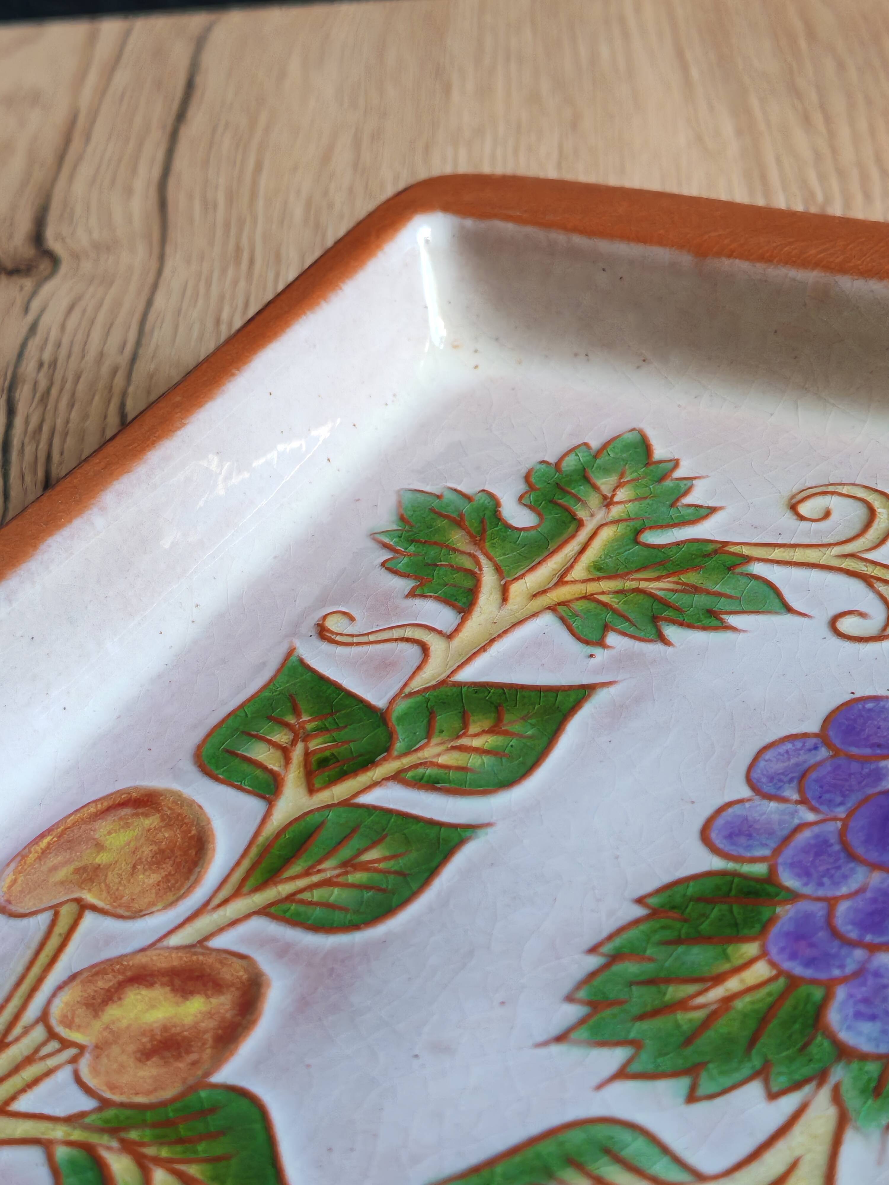 Terracotta plate signed P.Boy, glazed artisanal ceramics.