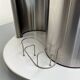 Vintage metal and smoked glass coffee table on casters bar