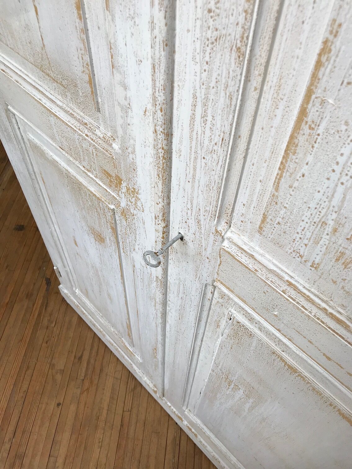 Antique wardrobe in patinated pine