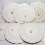 7 flat plates in Longwy rambouillet style earthenware, iron earth.