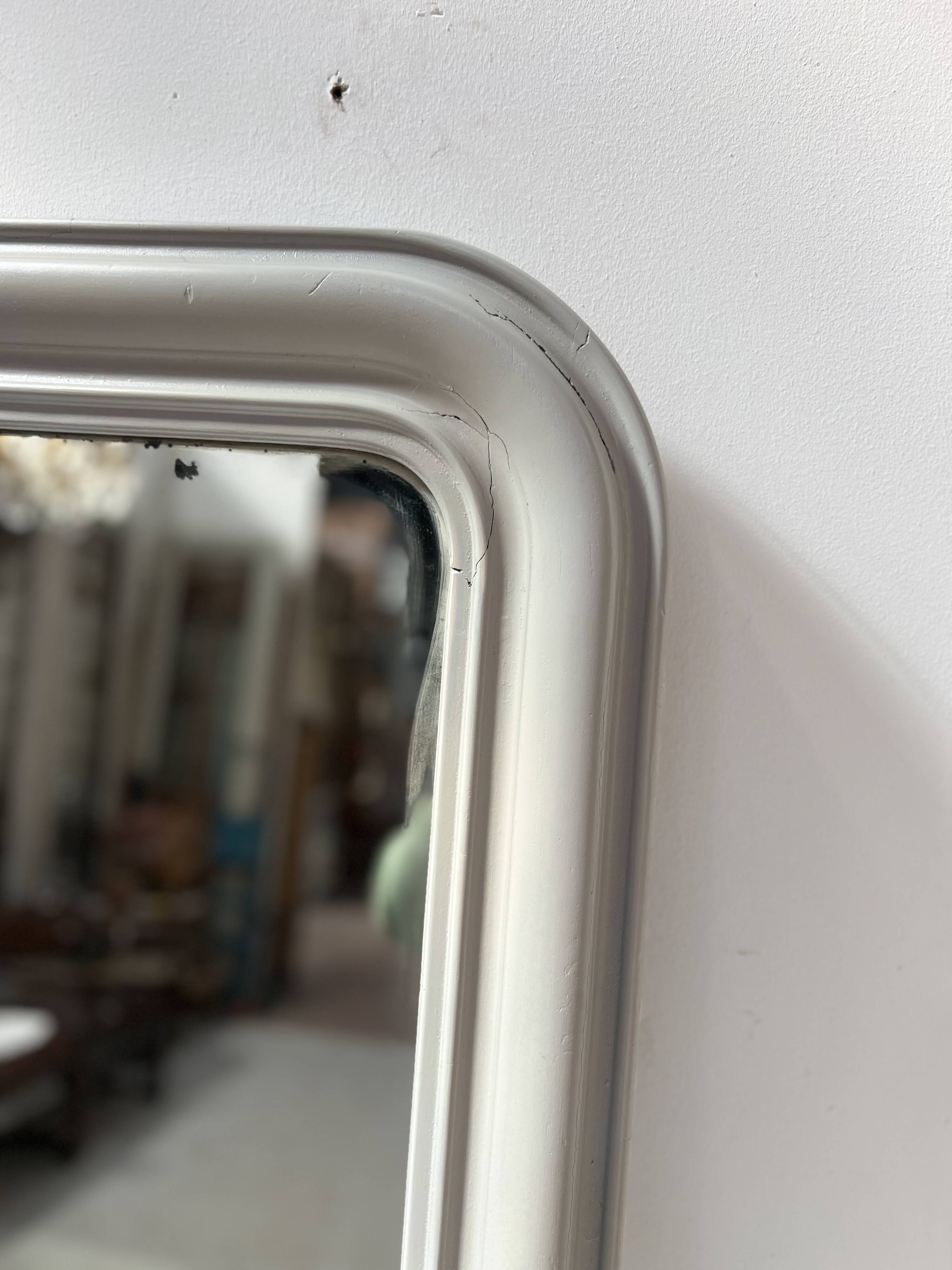 Louis Philippe mirror in wood and patinated stucco, 19th century