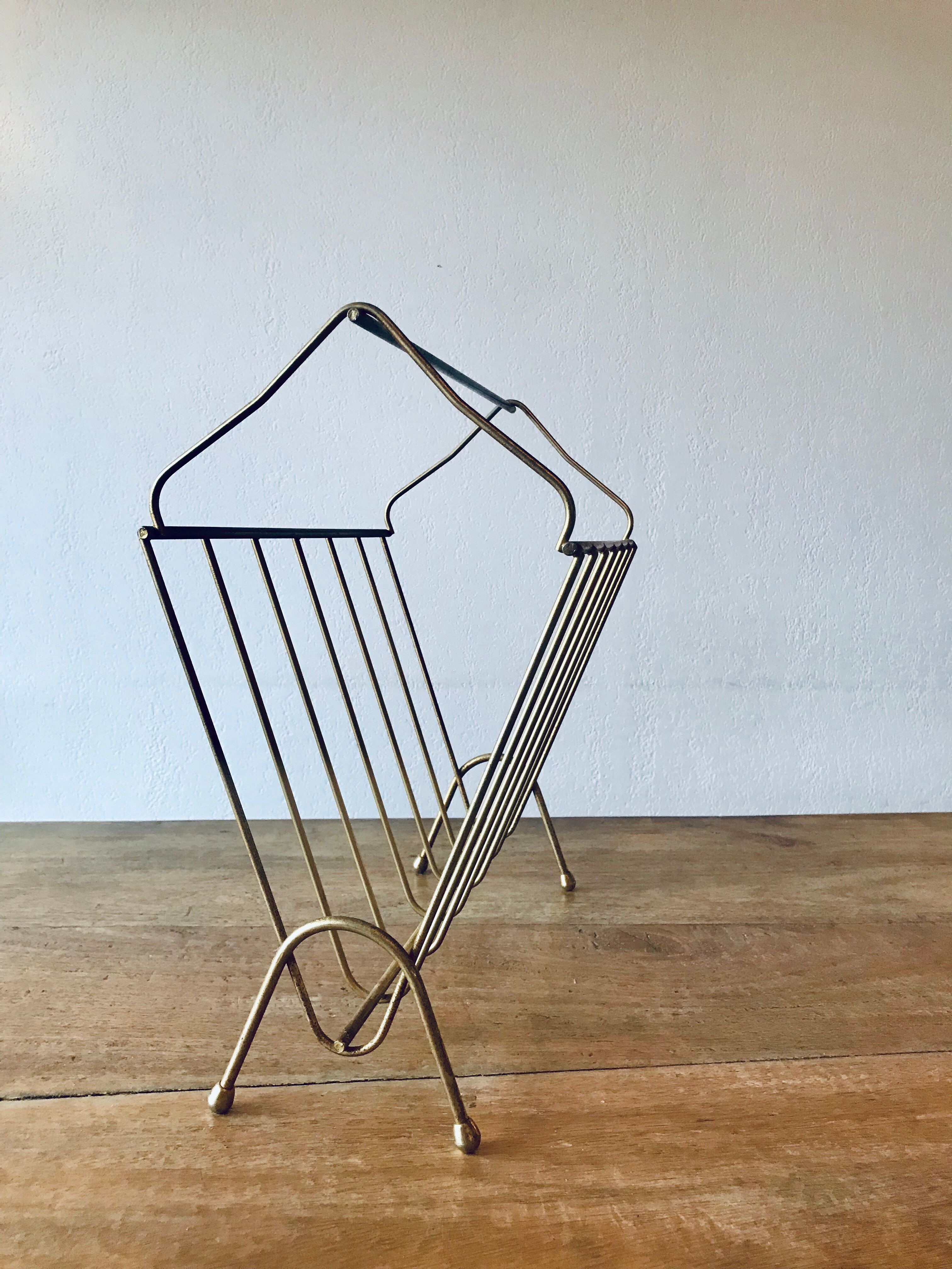 Porte-revue vintage en laiton doré
