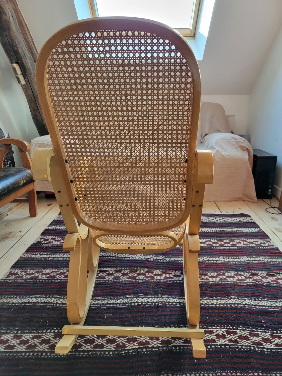 Rocking chair in arched wood and cane