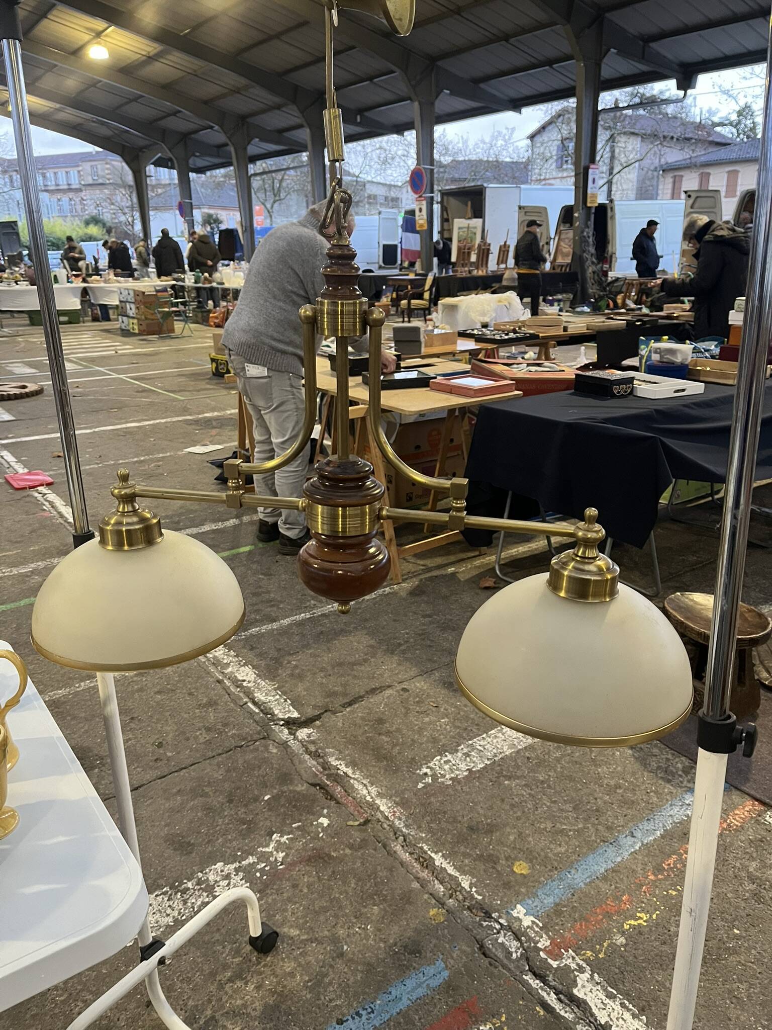 Vintage chandelier in wood and brass