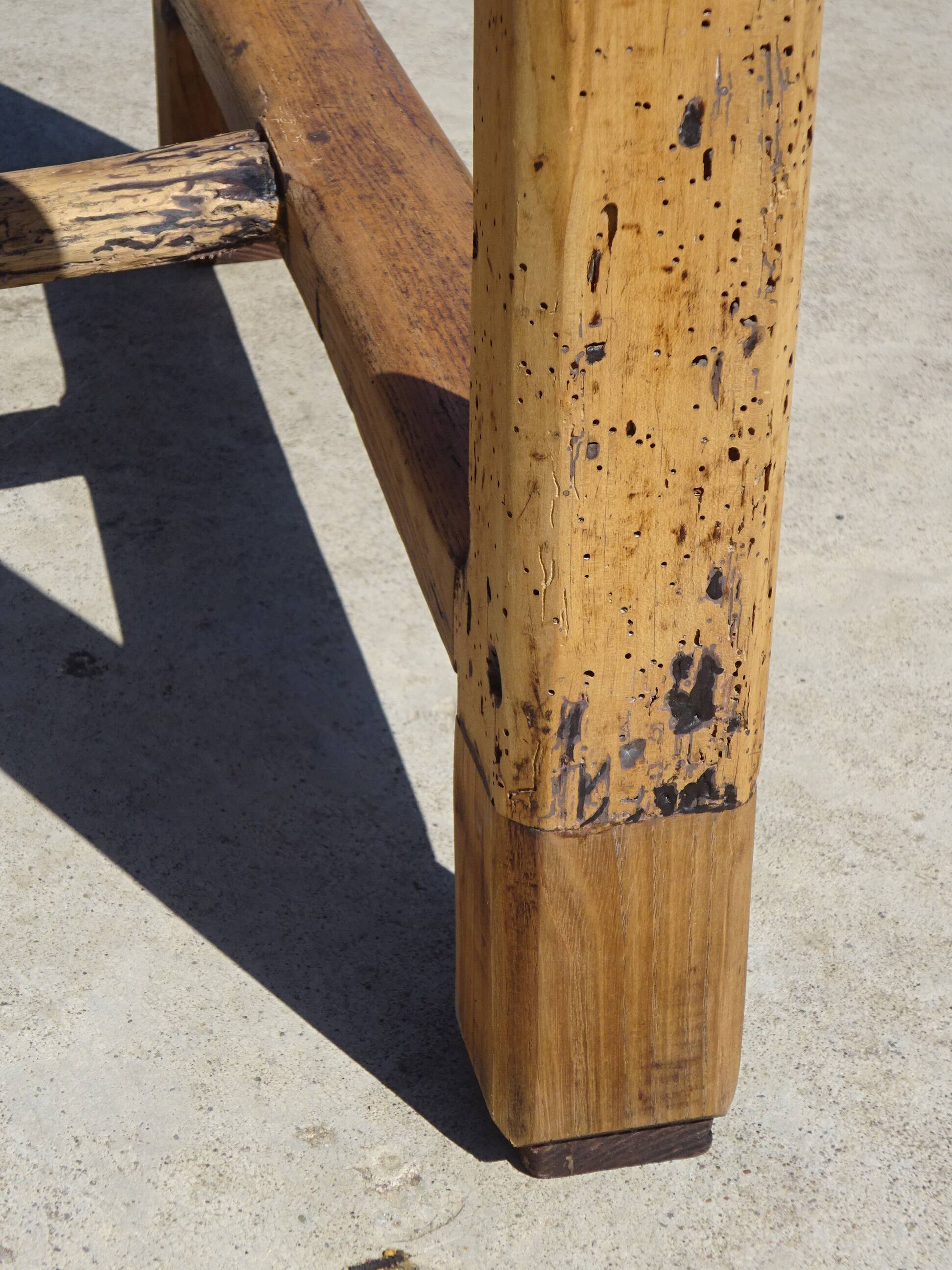 Old farmhouse table made entirely of restored solid oak.