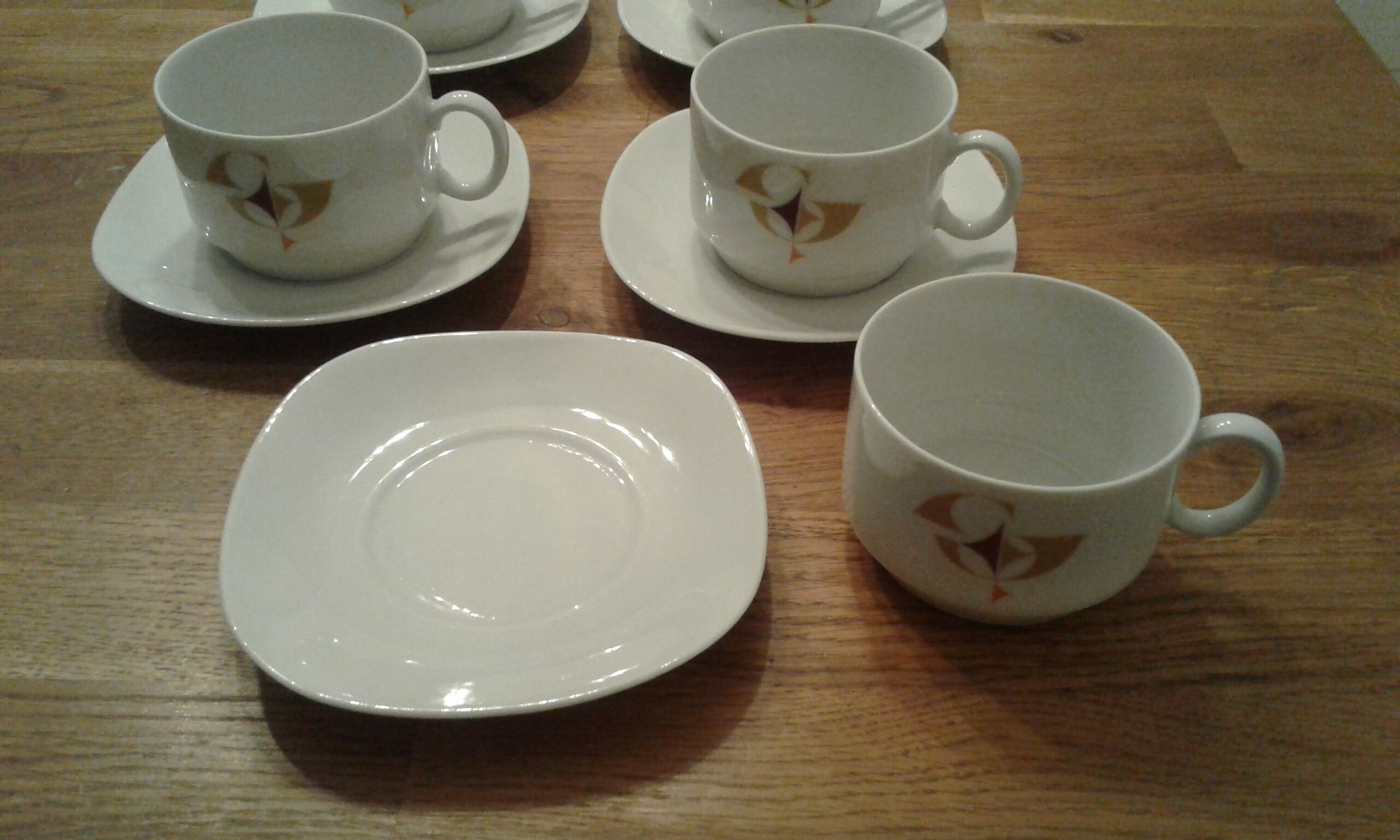 Set consisting of 7 cups and 7 sub cups. Porcelain. Vintage