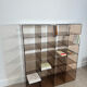 Shelf - library with 24 smoked plexiglass compartments by Michel Dumas